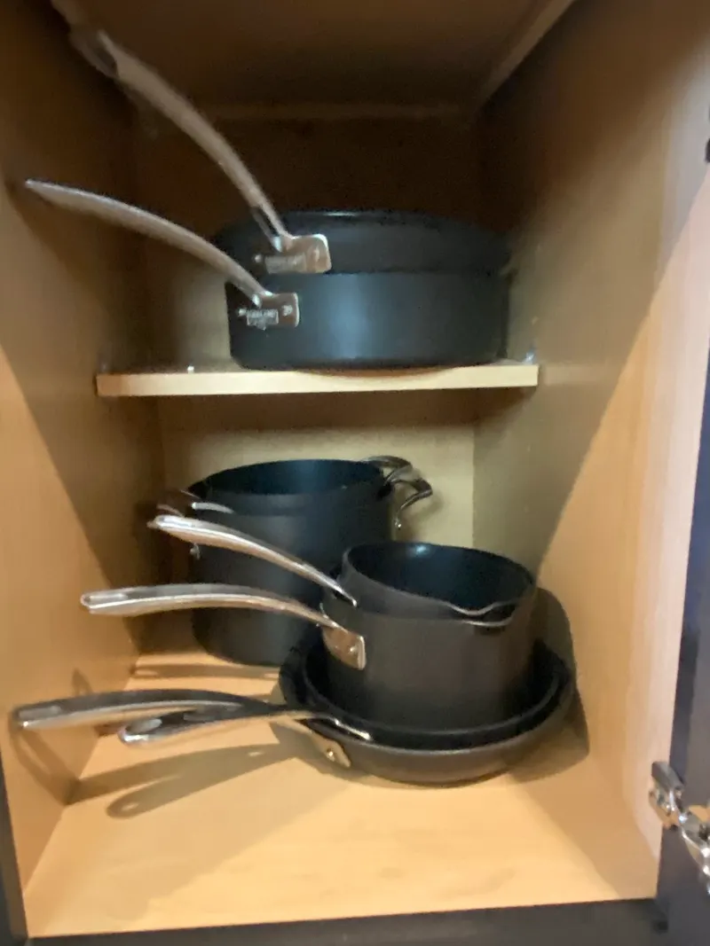 Stacked non-stick pots and pans